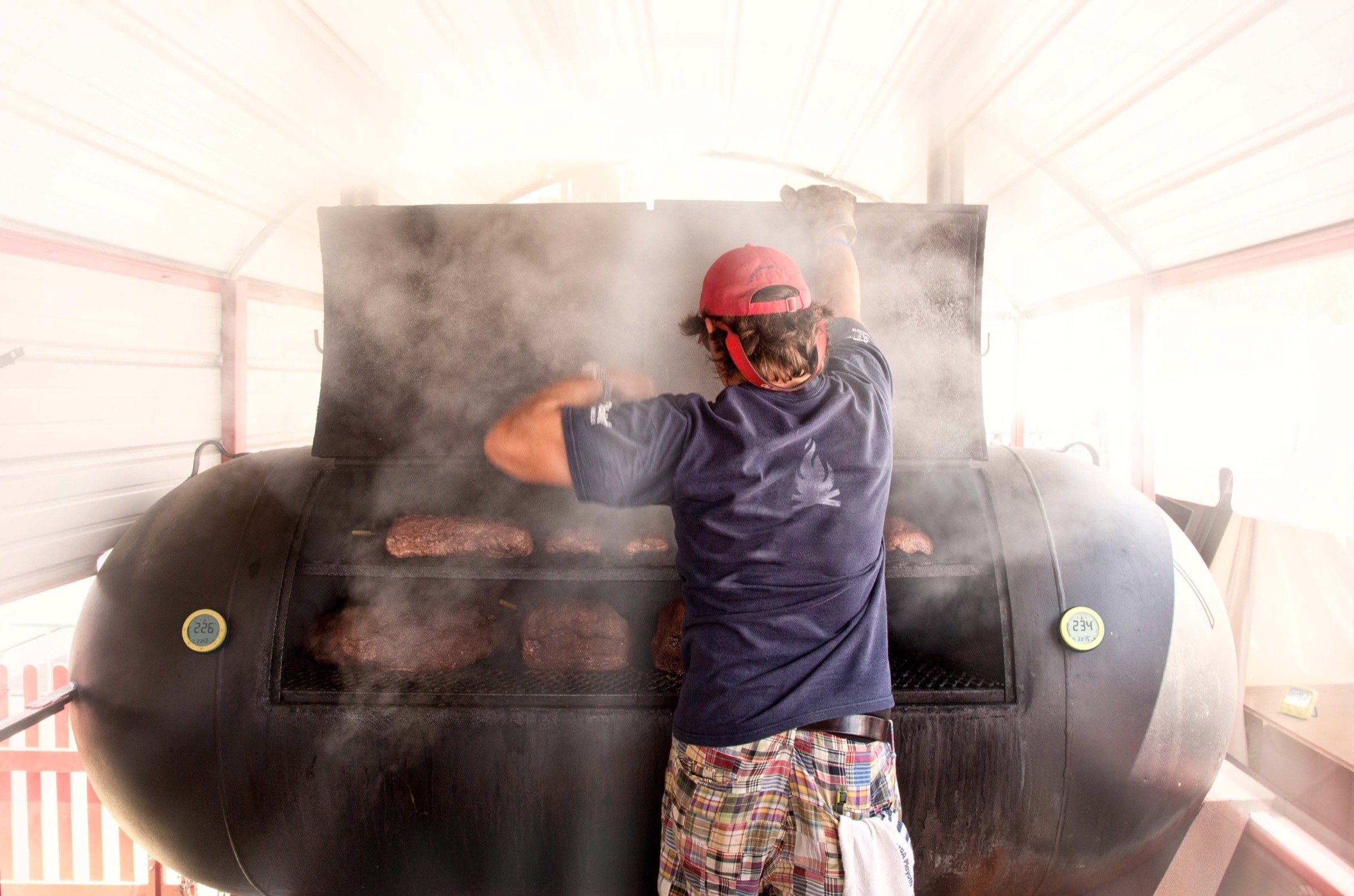 Jack from Combustion using a smoker with the predictive thermometer in his pocket